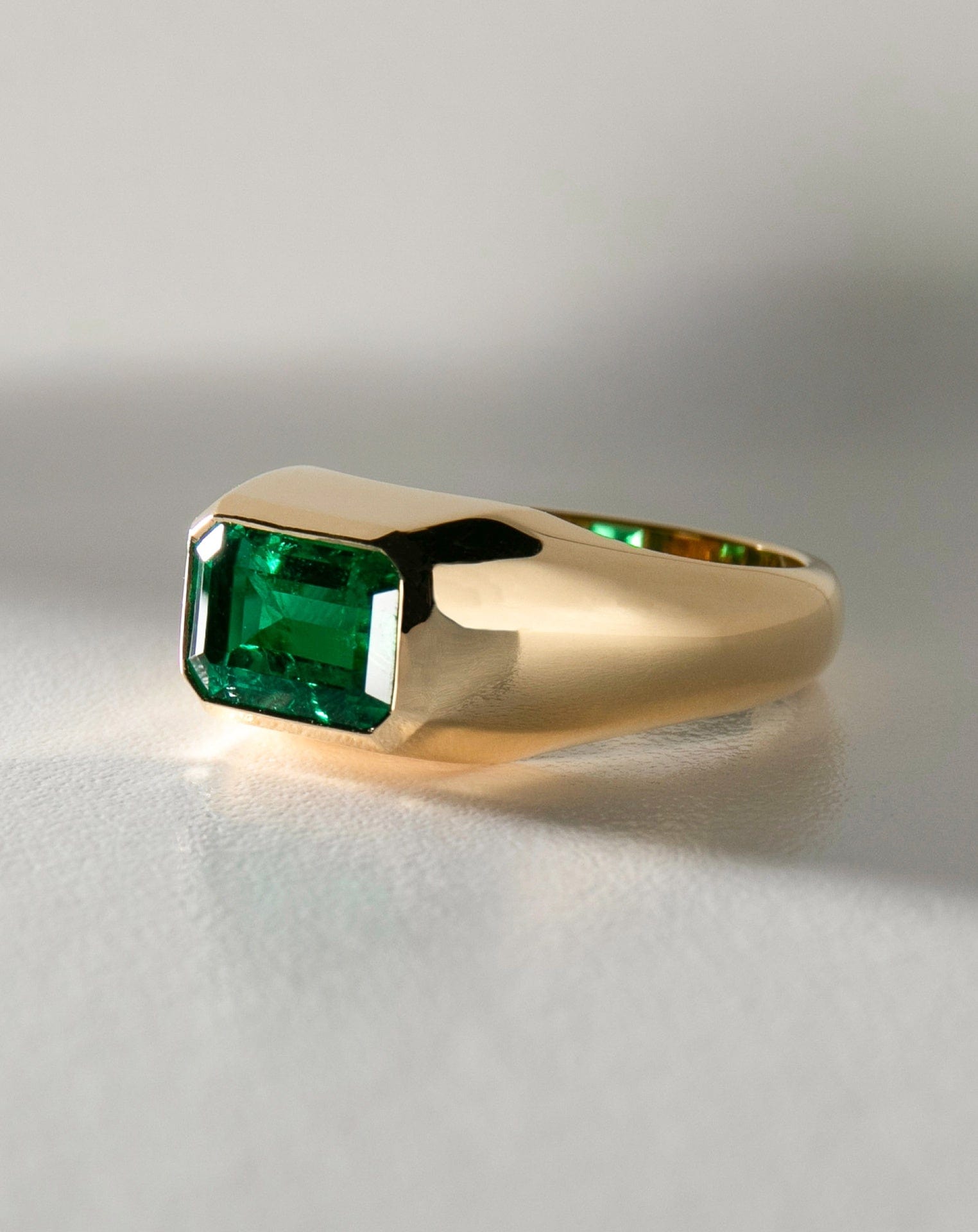 East West Emerald Signet Ring