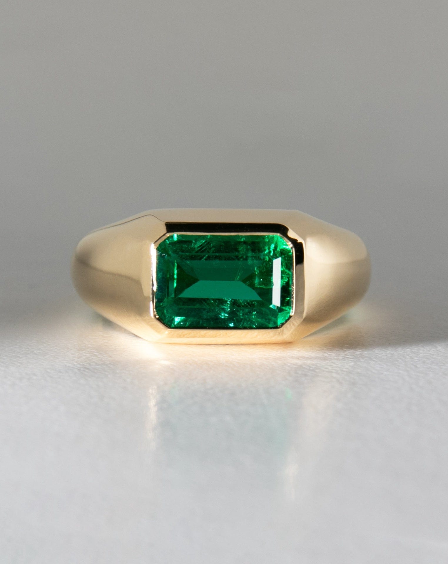 East West Emerald Signet Ring