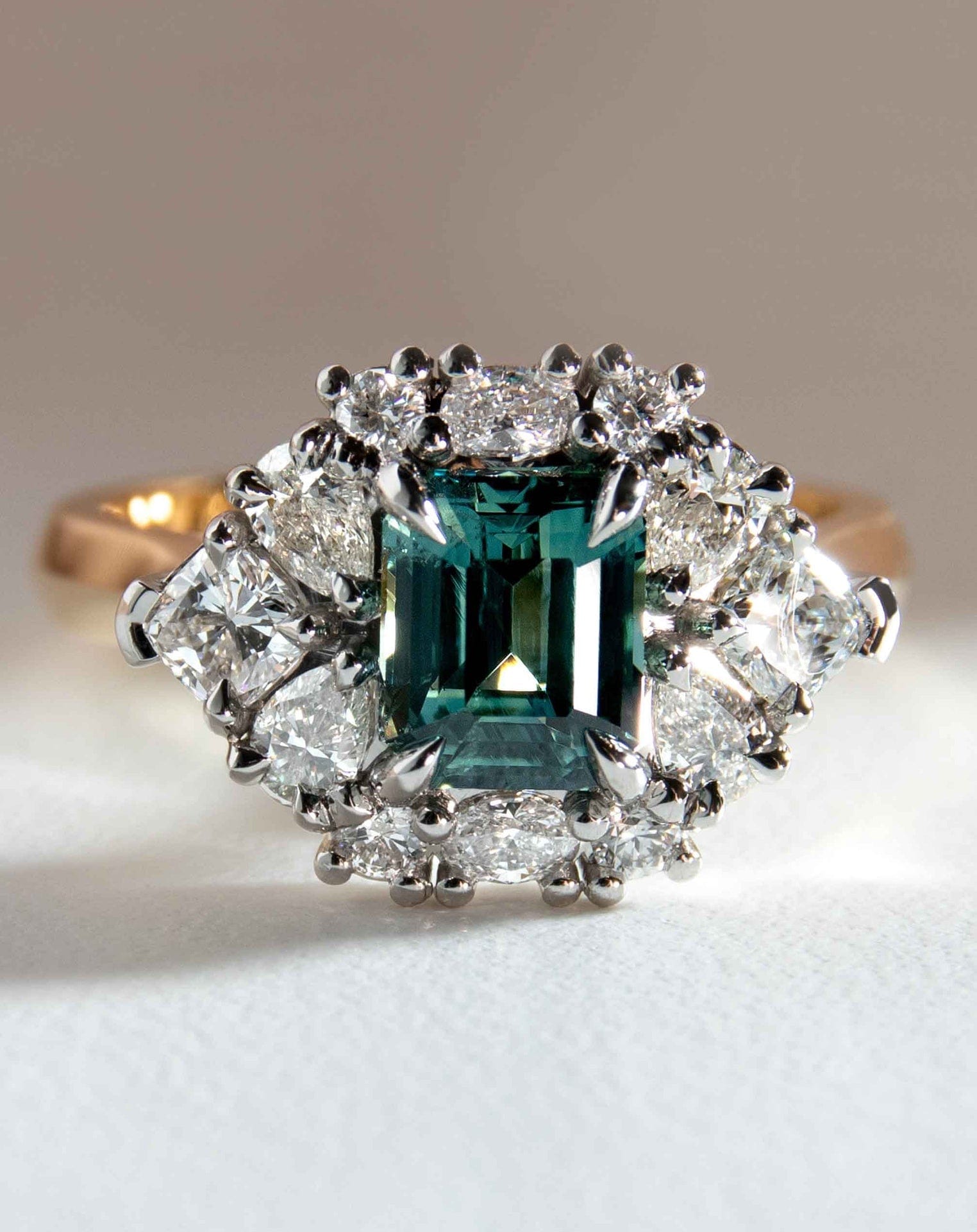 Emerald Cut Sapphire with Diamond Halo