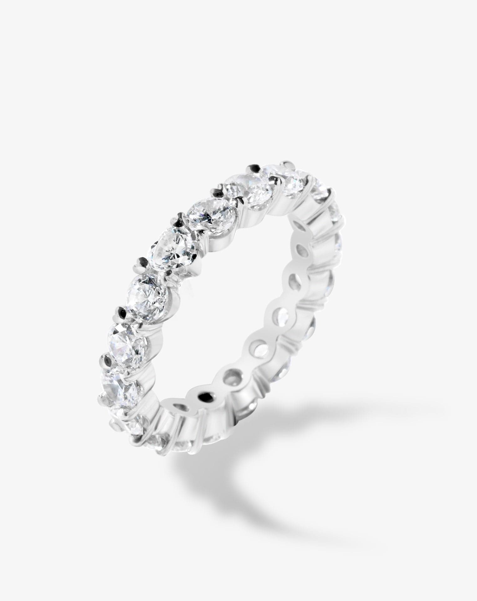 Young at Heart Full Eternity Claw Set Round Diamond Band