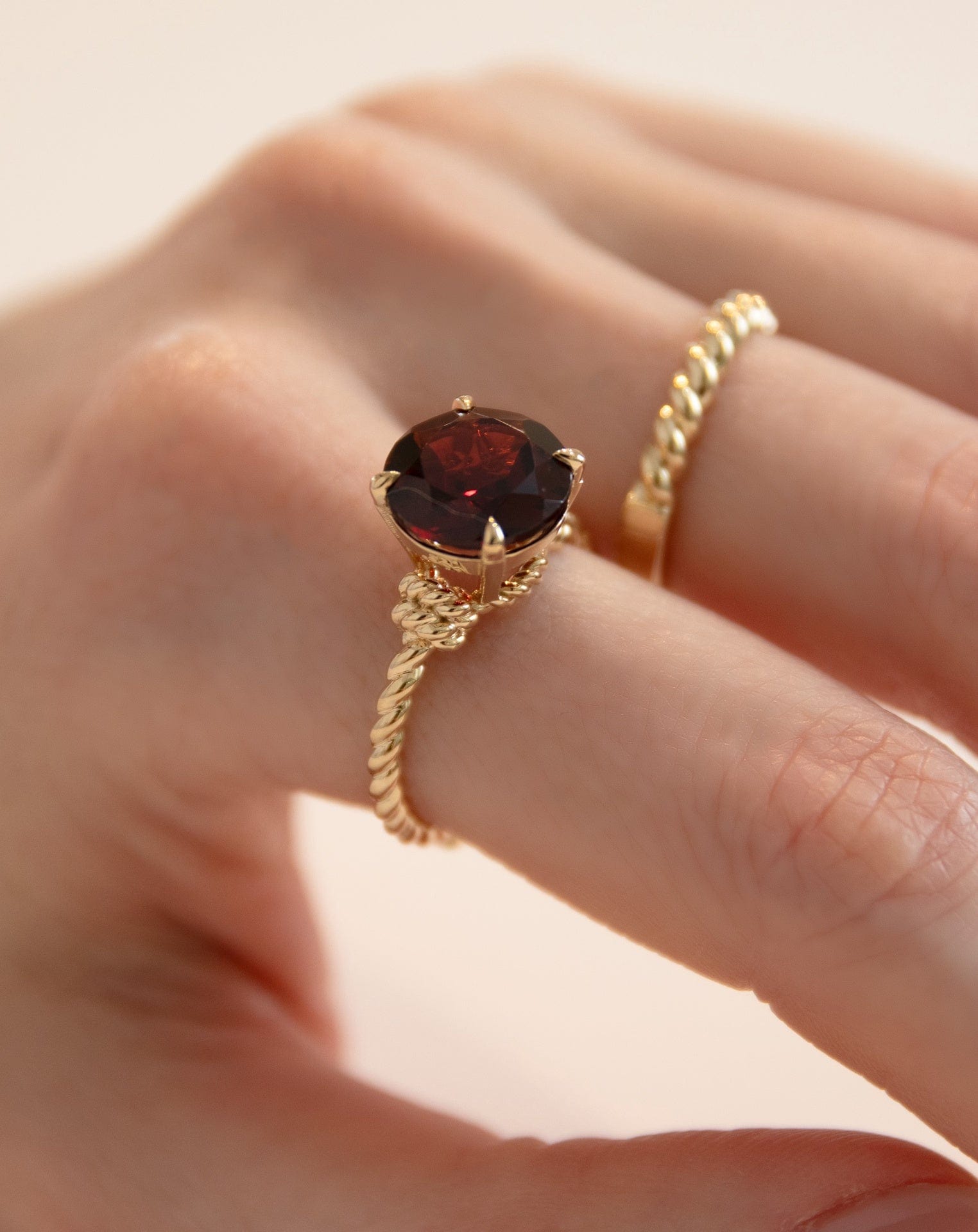 Garnet Knots Ring Yellow Gold