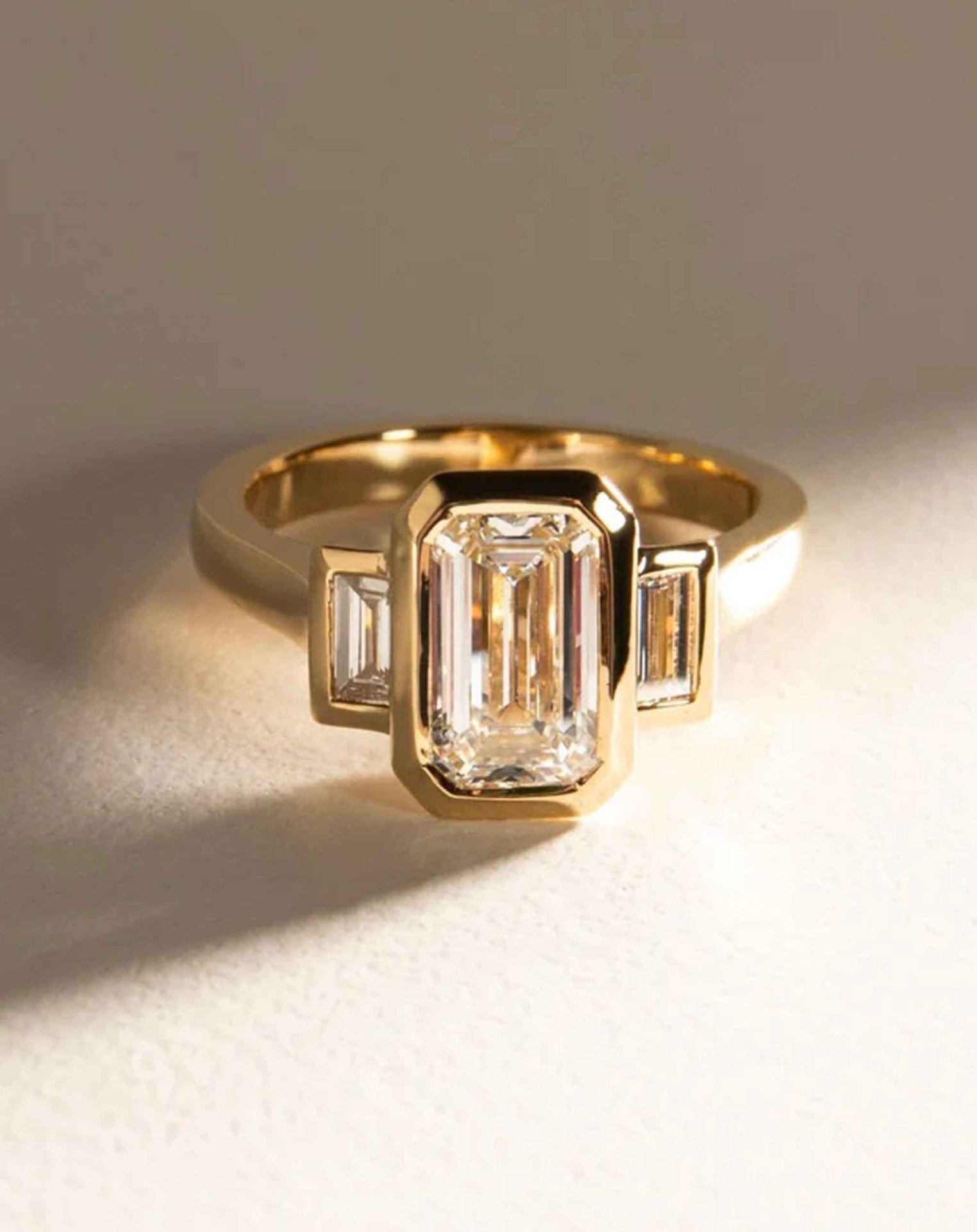 Step Cut Diamond Three Stone Ring