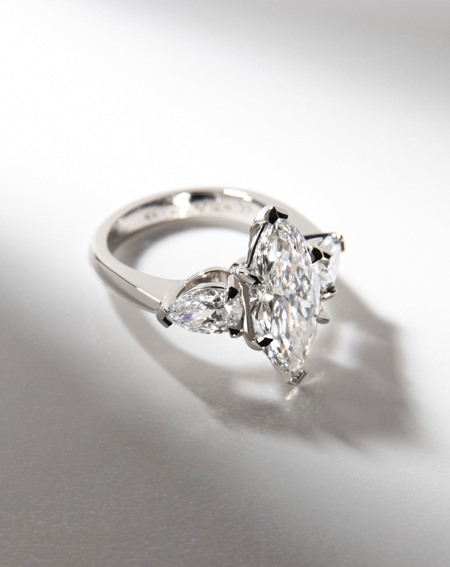 Marquise and Pear Diamond Three Stone