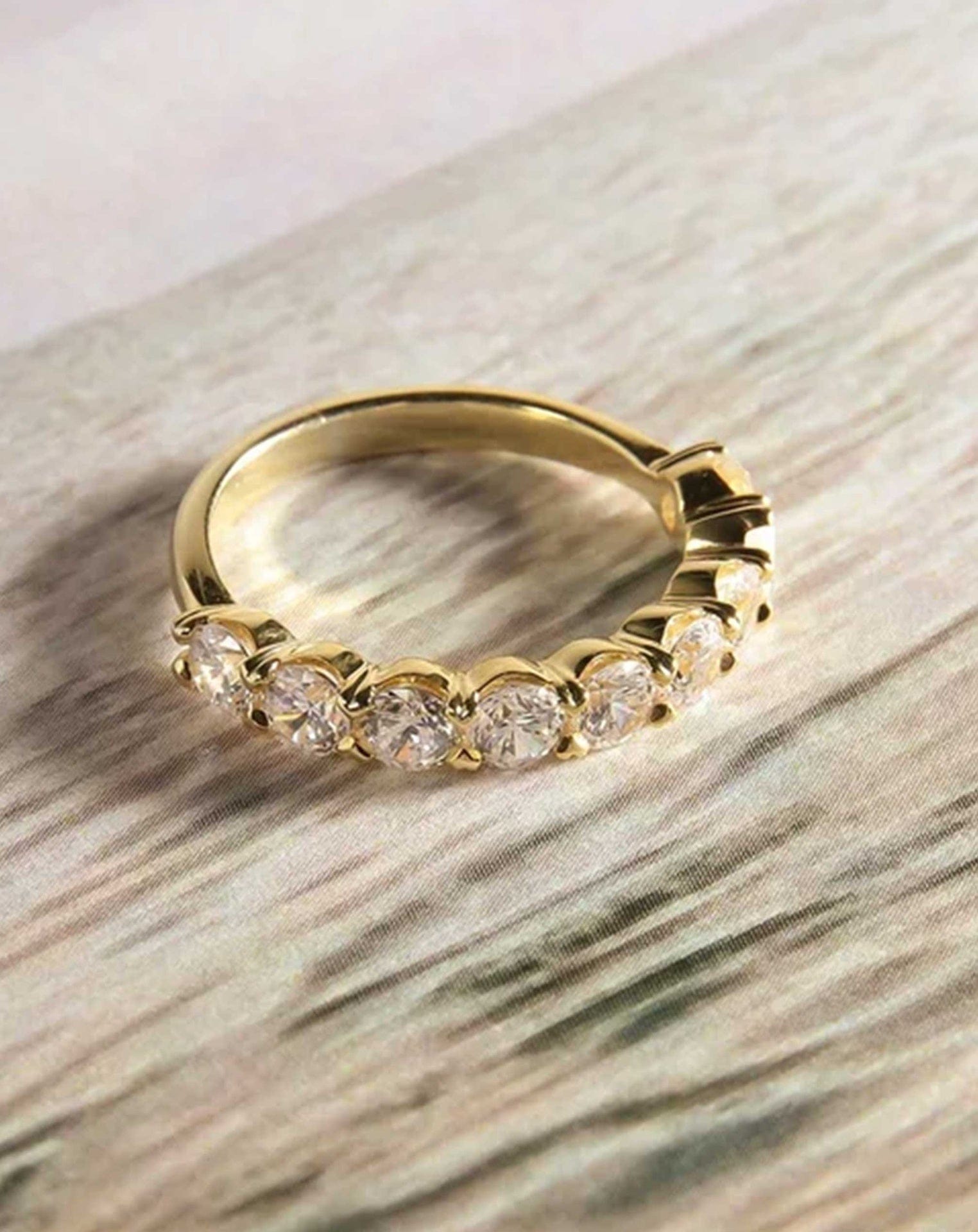 Young at Heart Claw Set Round Diamond Band