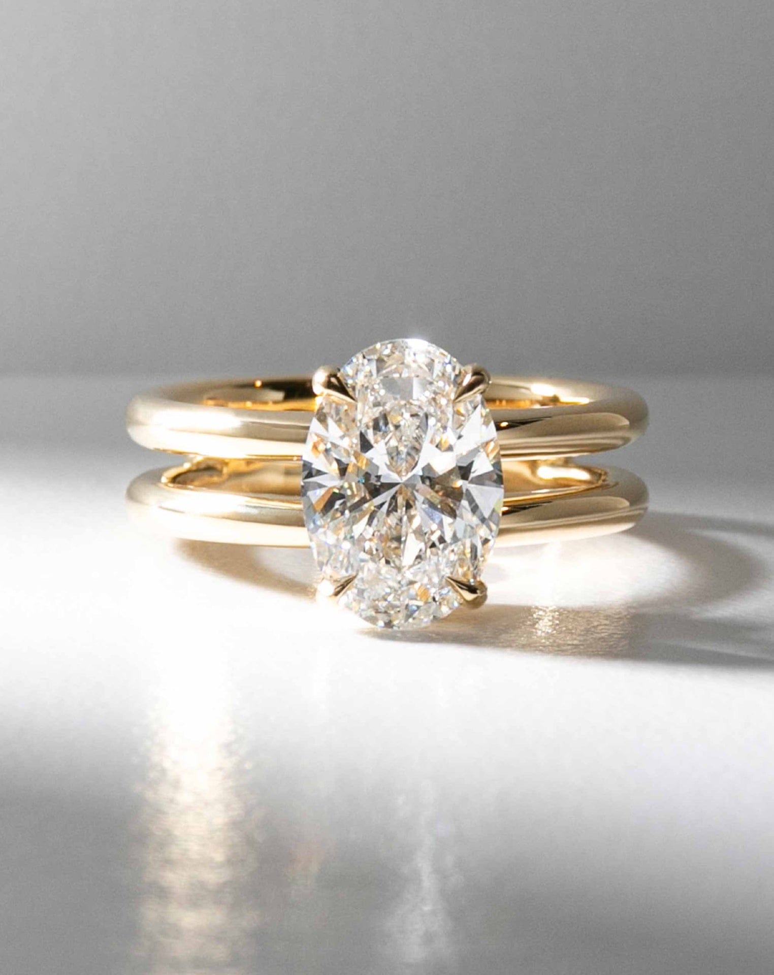 Double Band Oval Solitaire