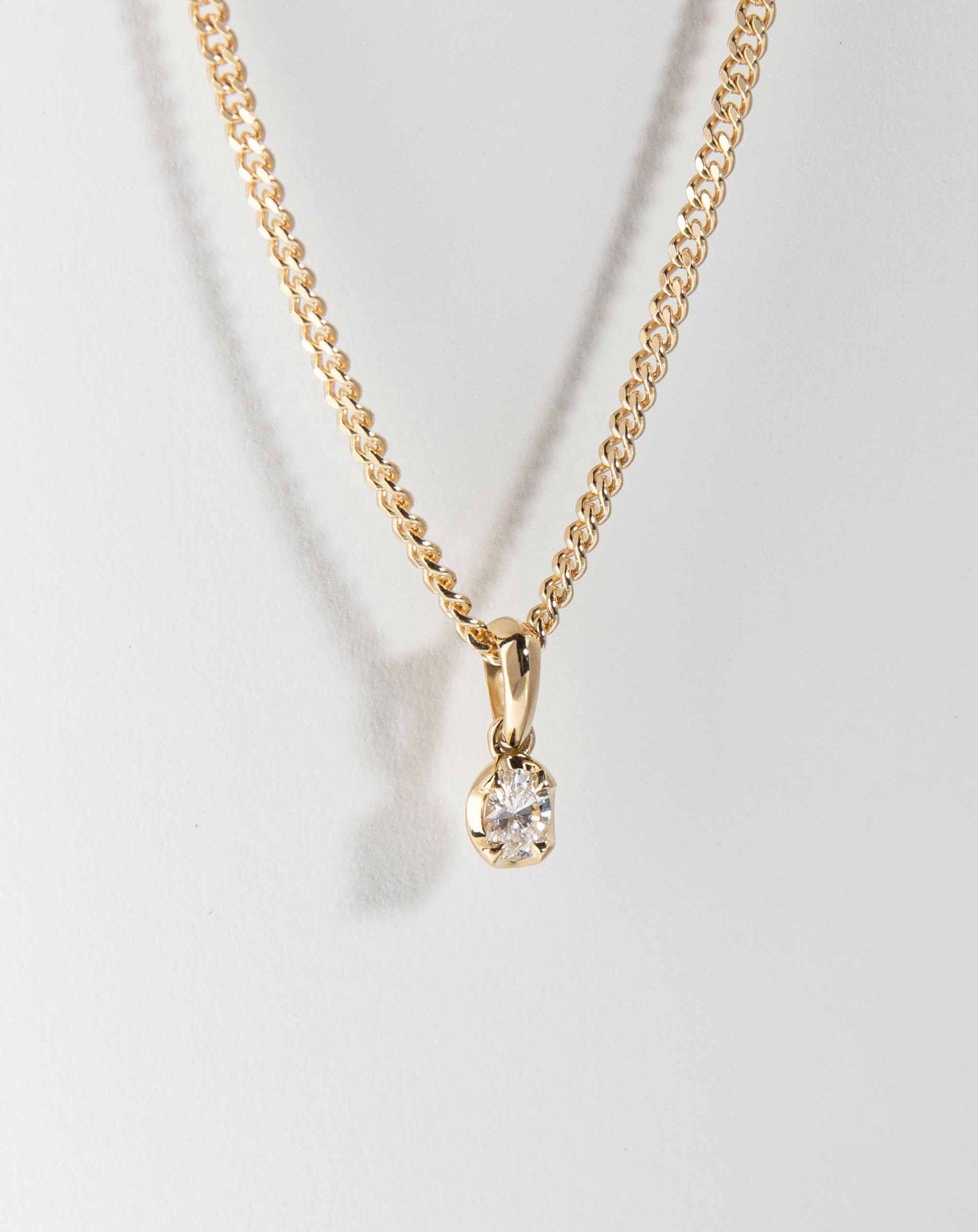 Oval and Yellow Gold Diamond Pendant